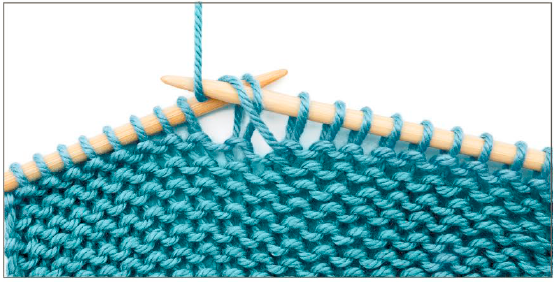 Wrap the yarn over and around the tip of the right